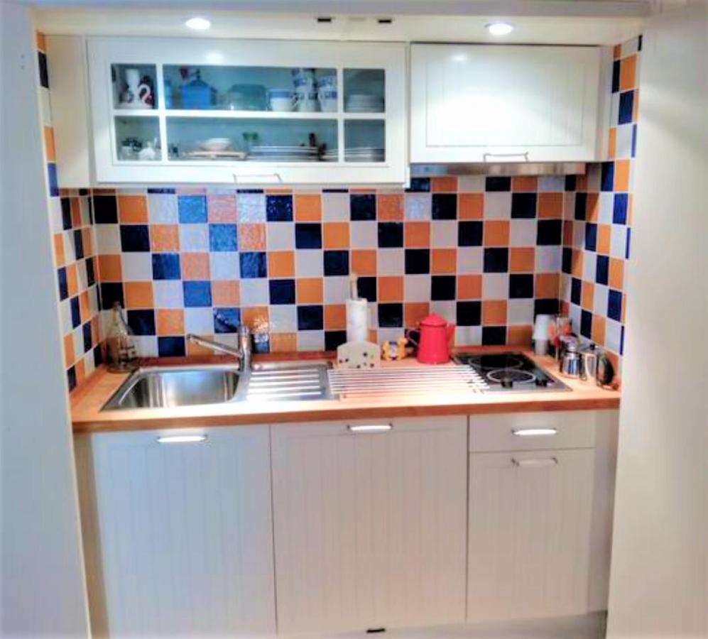 ¡en Frente De La Giralda-catedral! Apartamento